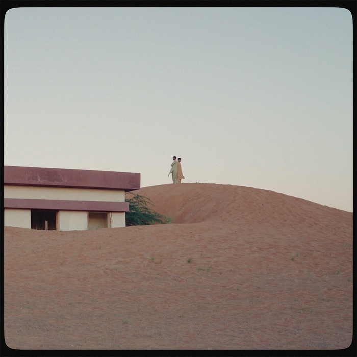 Al Madam village sunken in sand dunes